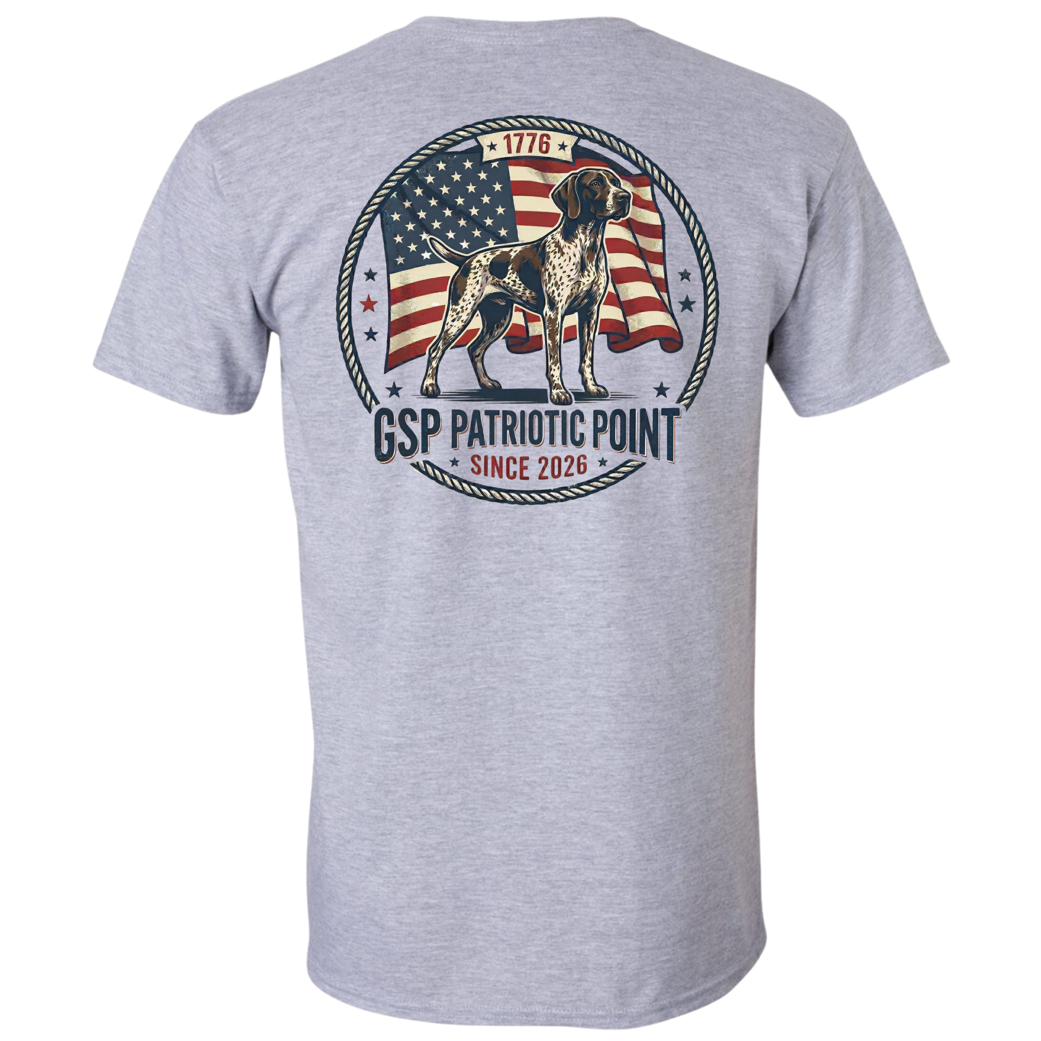 A sport gray short-sleeve t-shirt shown from the back, featuring a large circular graphic print with a dog standing in front of an American flag, surrounded by rope-style borders and the text 'GSP PATRIOTIC POINT SINCE 2026'.